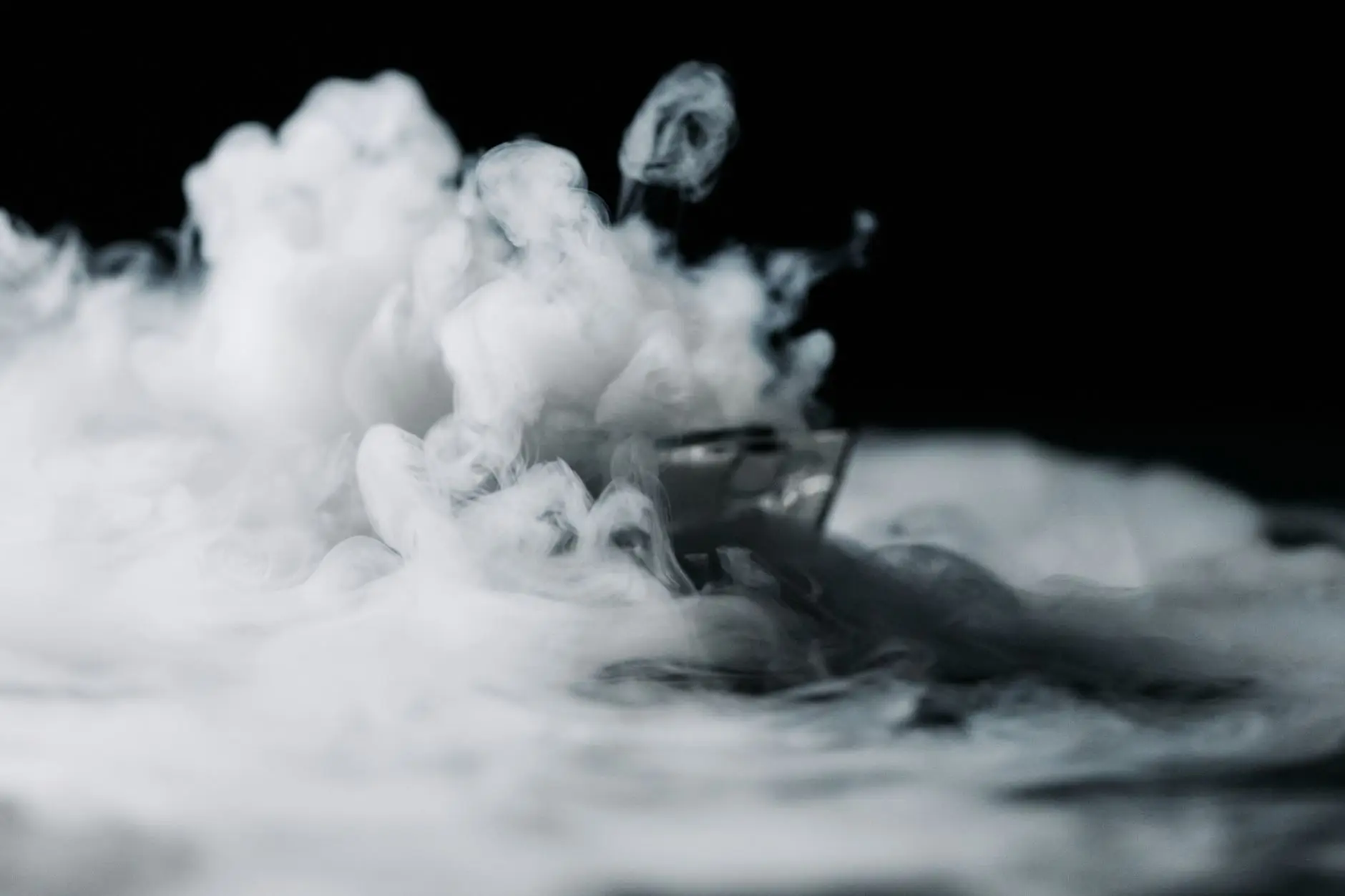 Captivating scene of thick, swirling smoke with a dark, mysterious ambiance.