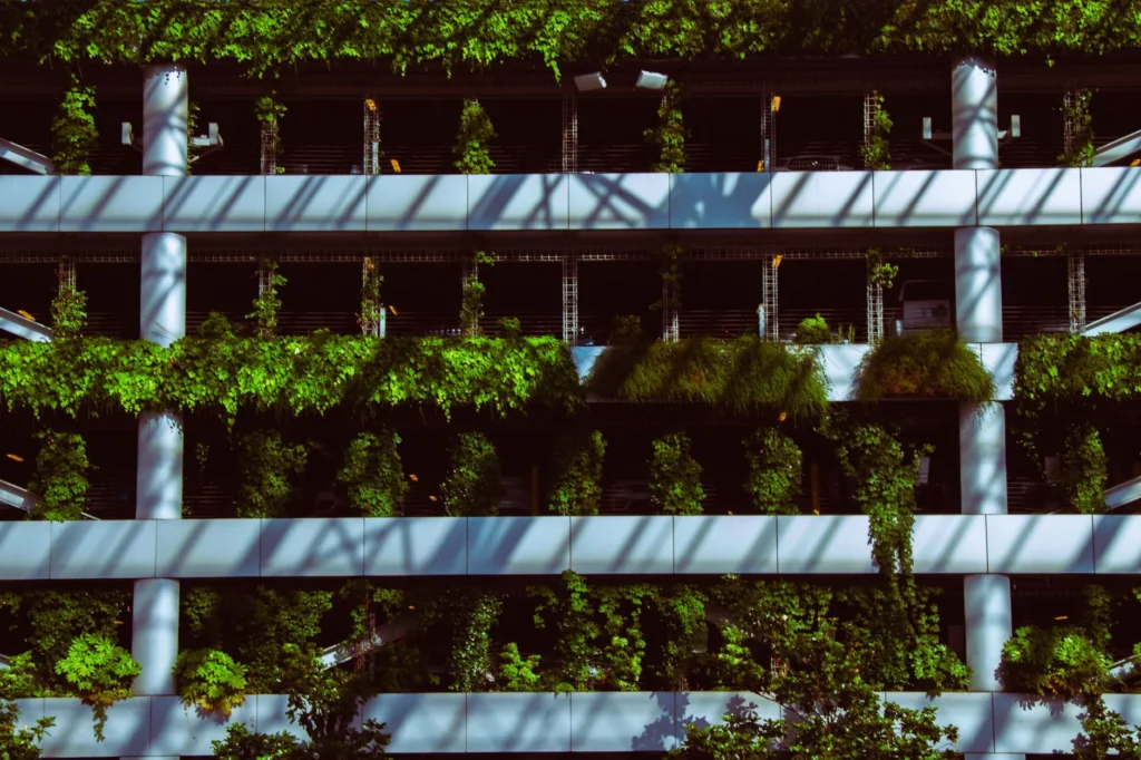 Modern facade with lush vertical garden in Portland, showcasing urban greenery.