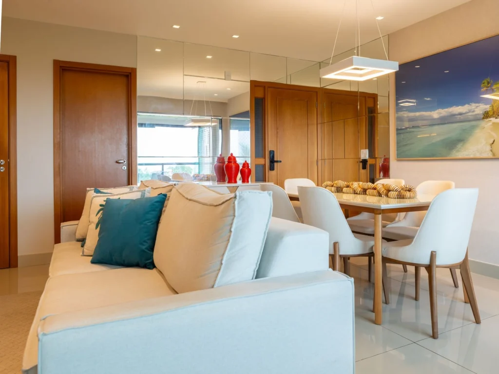 Stylish living room in Salvador, Brazil featuring modern decor, cozy furniture, and vibrant accents.