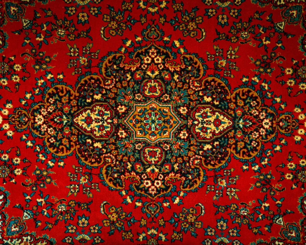 a red carpet with a colorful design on it